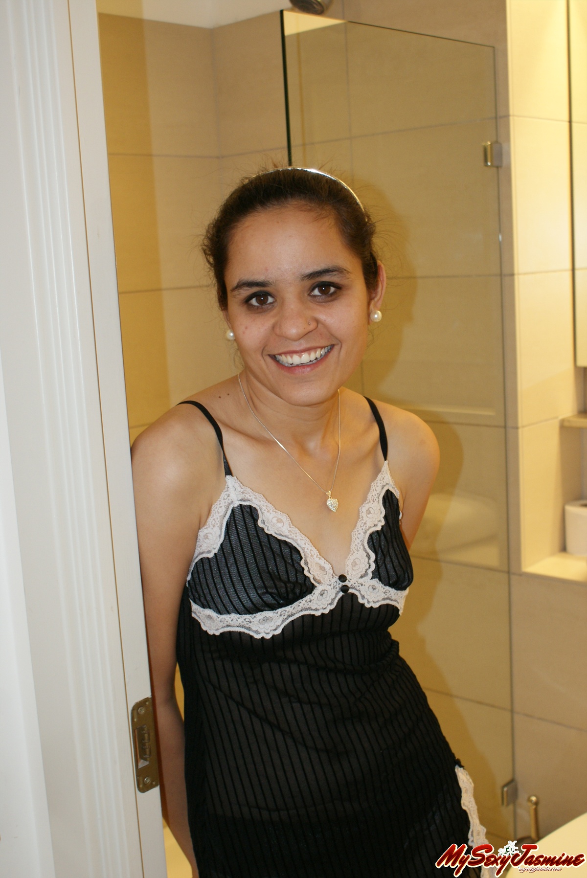 Pic gal 0022. Jasmine in horny black top in shower getting naked