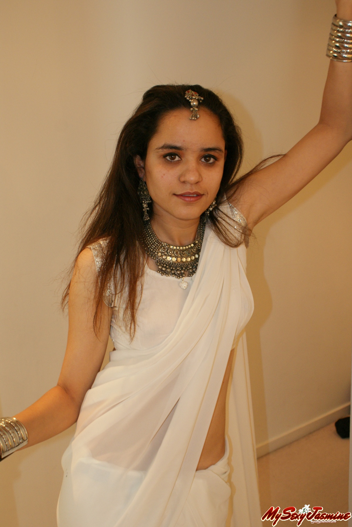 Pic gal 0026. Jasmine in white indian saree looking hot teasing